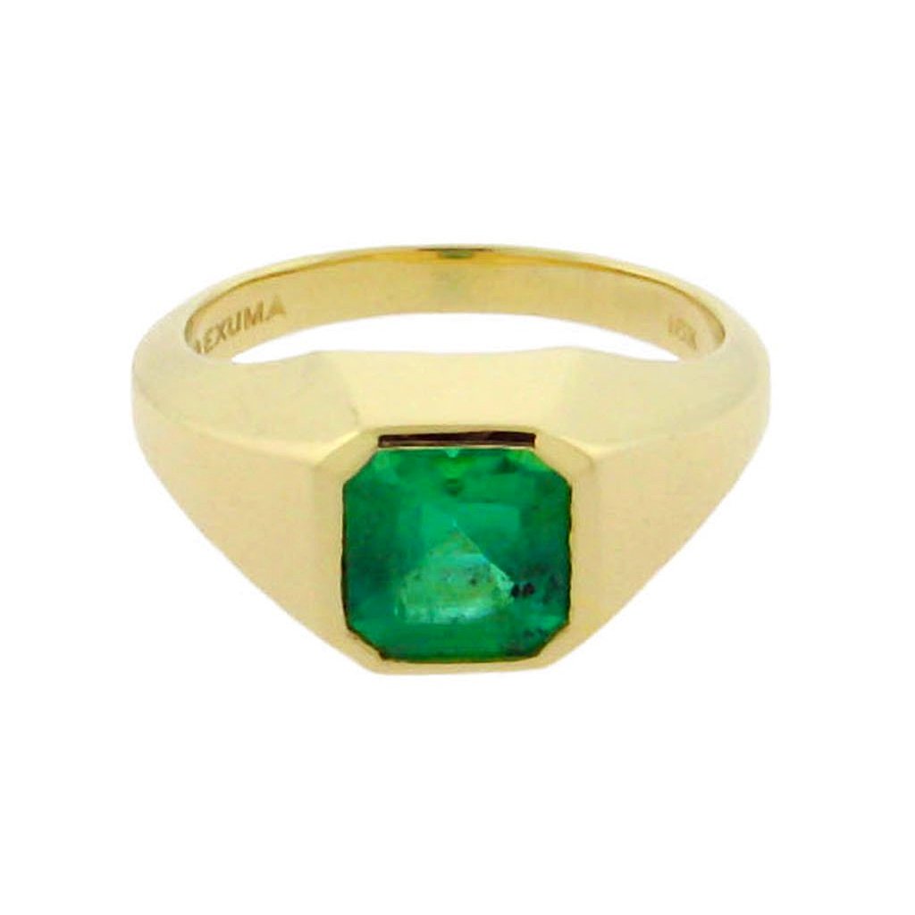 large square emerald set in a 14 k yellow gold ring 
