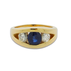 1.85 ct round blue sapphire  .92 ct total weight round diamonds  14 k yellow gold ring