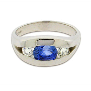 1.82 ct oval cut sapphire  .42 total weight round diamonds  14 k white gold ring 