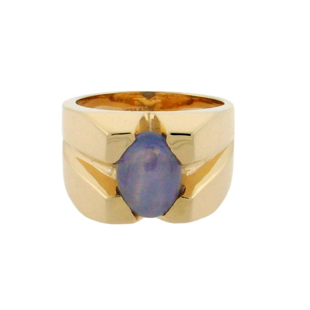 Double star cabochon sapphire set in 14 k yellow gold