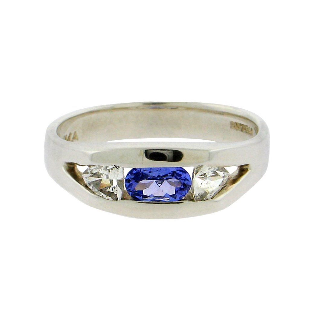 oval tanzanite  trillion cut white sapphire sterling silver ring