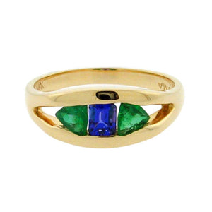 .27 ct emerald cut tanzanite  .37 ct total weight trillion cut emerald  14 k yellow gold ring